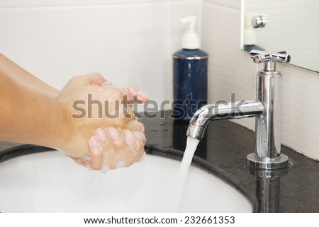 cleaning hand with a sink