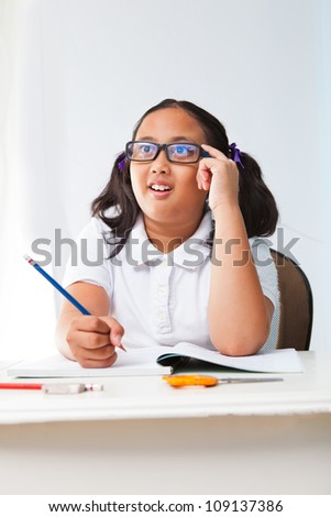 girl student studying in class room