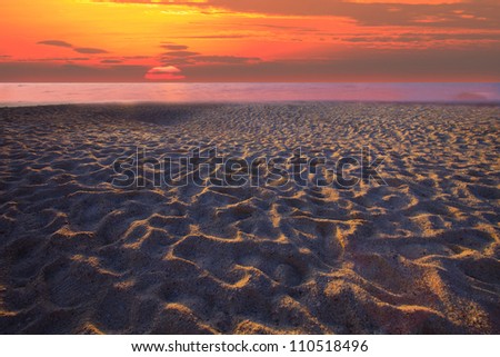 sun set and sand beach with rim light