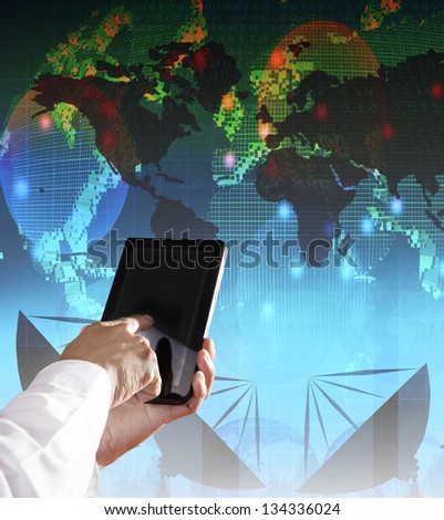 hand and computer tablet with modern office building background use for modern business and city life style