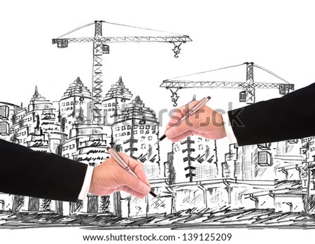hand of businessman writing on sketching of building construction  use for construction business theme