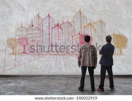 two man standing and watching to sketching of modern building on wall