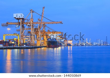 ship yard with heavy crane in beautiful twilight of day use for import export industry and international trading