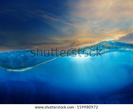 under clear water with beautiful dramatic sky above use for multipurpose natural background