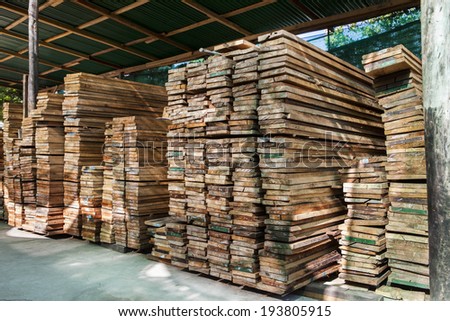 stack of pile wood bar in lumber yard factory use for construction wood industry