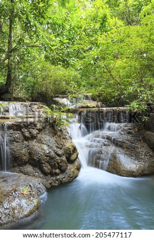 lime stone water fall in arawan water fall national park kanchanaburi thailand use for natural background