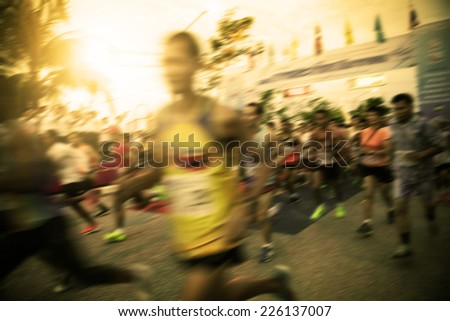 blur of marathon runner at start point  begin the competition
