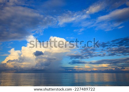 beautiful blue sky with cloud scape over blue ocean use as natural background,backdrop