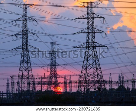 beautiful sunset behind electricity plant industry estate use as electrical power background