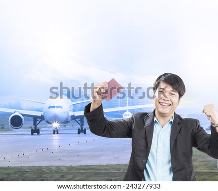 young business man and visa passport in hand was approve with happy face for traveling by plane to destination