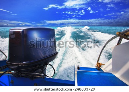 rear view from speed boats running against clear sea blue water beautiful blue sky outdoor location use for traveling and nature destination theme