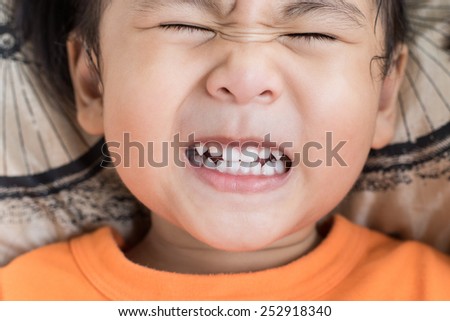 close up funny face of children toothy acting