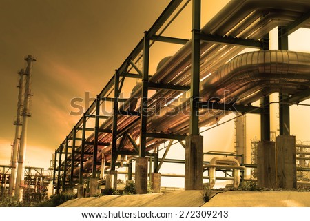 perspective of industry pipe line and beautiful dusky sky use as petrochemical industrial estate background