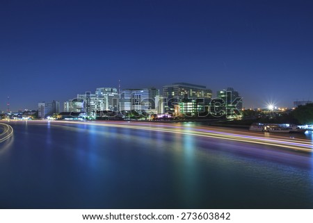 light of boat running in river painting beautiful light in chao phraya river with sirirach hospital one of important bangkok landmark of thailand