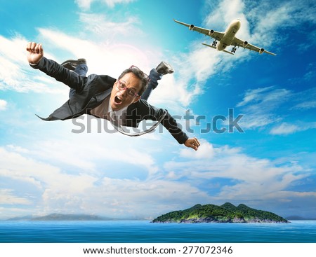 business man flying from passenger plane over natural blue ocean island use for people holiday and vacation time to relaxing destination