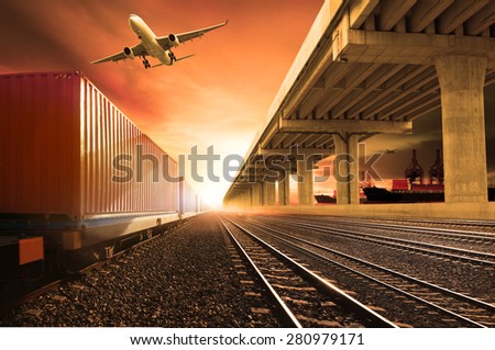 industry container trains on railways track cargo plane flying with land bridge transportation and ship port for land ,air ,ship transportation in logistic business industry ,import export,shipping