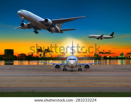 cargo plane flying over airport against beautiful morning light in ship yard use for transportation and logistic industry business