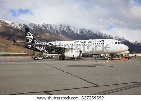 QUEENTOWN NEW ZEALAND-SEPTEMBER 6: air new zealand plane preparing to flight at queentown airport in south island new zealand on september 6, 2015 in QueenTown New Zealand