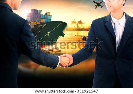 business man shaking hand ,success of agreement solution goal with shipping transport and commercial logistic industry background