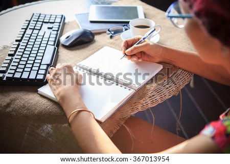 woman writing shot memories note on white paper with relaxing time and emotion