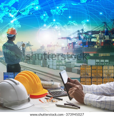 hand of business man working on working table in container dock use for logistic industry and import export , freight cargo shipping industrial