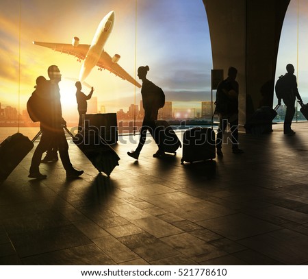 people and traveling luggage walking in airport terminal and passenger plane flying over urban scene