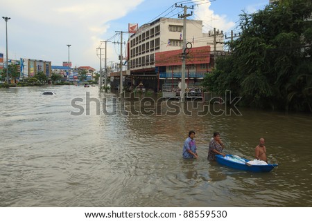 AYUTTHAYA THAILAND-OCT9 : Road in Ayutthaya province full of flood water ,higher water levels than expected,Large area affected by flood on Oct 9 , 2011in Ayutthaya Thailand