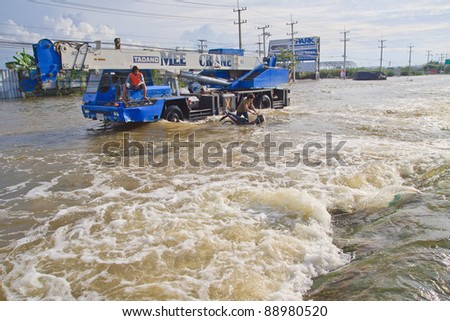 AYUTTHAYA THAILAND - OCT 14 : Phaholyothin road full area of higher flood water on october 14,2011 in Ayutthaya Thailand