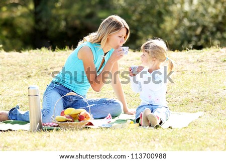Mom and daughter on picnic