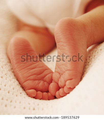 a feet one cute newborn little baby