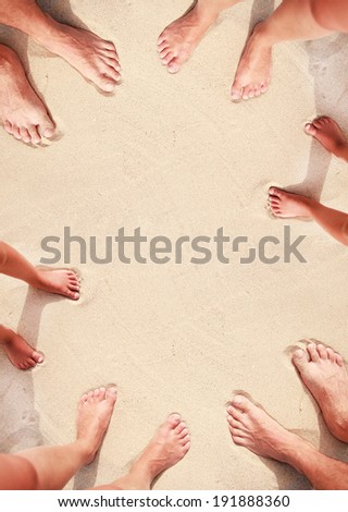 a family footprints in the sand on the seashore