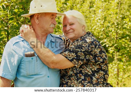 elderly couple on nature