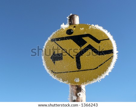 A sign shows the way to the cross-country track