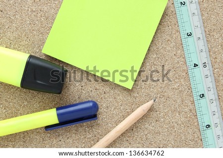 office tools on cork board