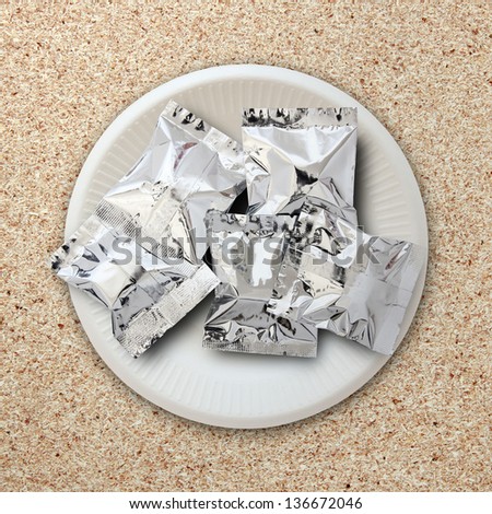 foil package on white plate