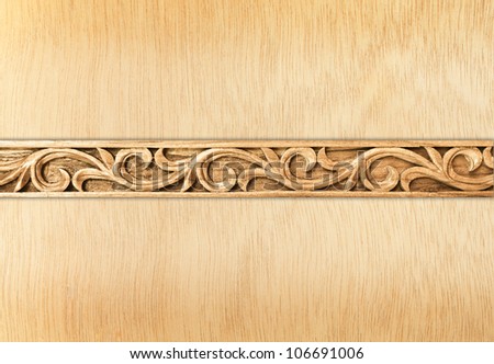 Pattern of flower carved frame on wood background