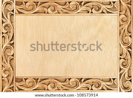 Pattern of flower carved frame on wood