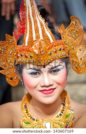 BALI, INDONESIA - MARCH 16: Girl during a classic national Balinese dance Barong on March 16, 2013 on Bali, Indonesia. Barong is very popular cultural show on Bali.