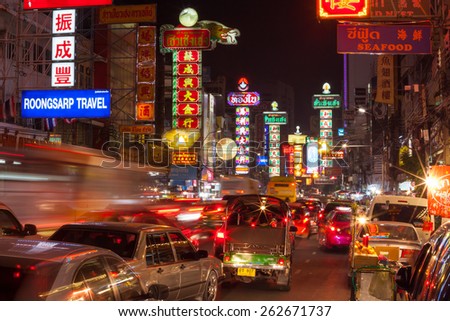 BANGKOK - DECEMBER 31: Busy Yaowarat Road in the night on December 31, 2014 in Bangkok. Yaowarat Road is a main street in Bangkok\'s Chinatown.
