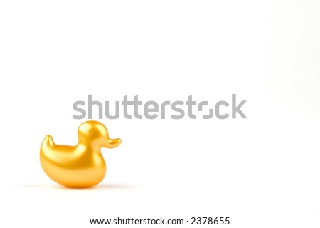 bath soap in the shape of a yellow duck, isolated on white background