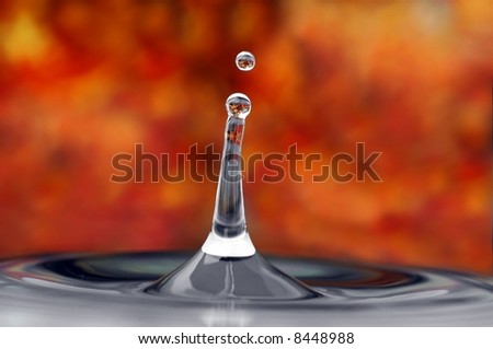 isolated tower of water and droplet in an autumn environment