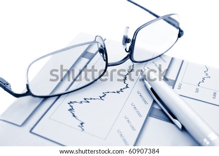 Pen, Glasses and stats on a white background.