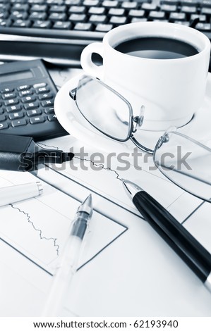 Scientific Calculator with glasses, keyboard and a cup of coffee