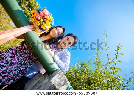 stock photo Pre wedding couple with bouquet
