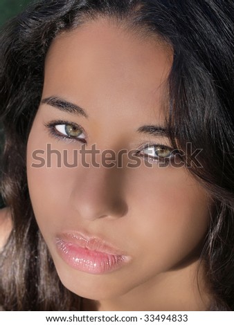 Tight portrait of pretty young mixed woman