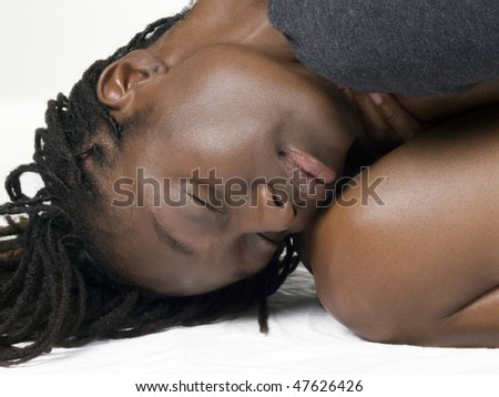 Young African American Woman eyes closed head down