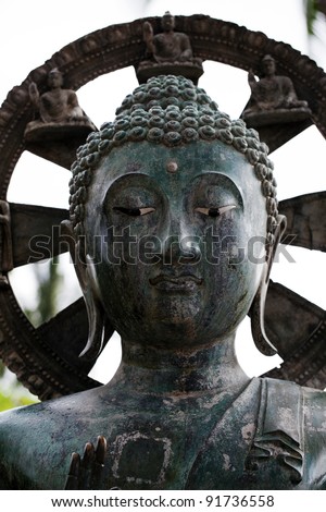 Portrait of buddha statue head bronze with halo