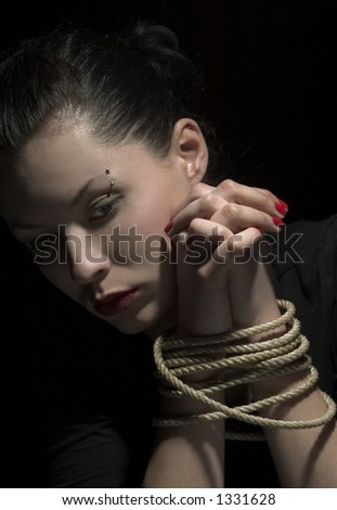 sad lady band with rope