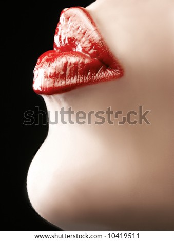 red soft female lips in kissing pose