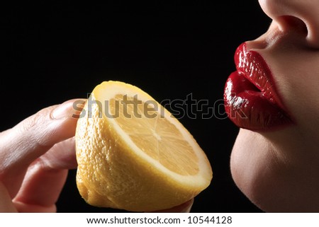 Hand Holding Lemon
